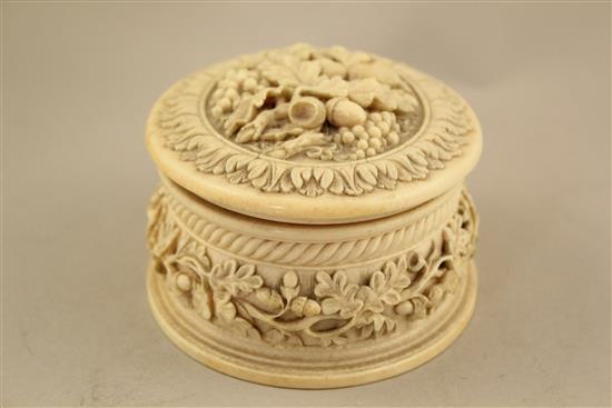 A 19th century oval carved ivory table box, 5.5in., some faults